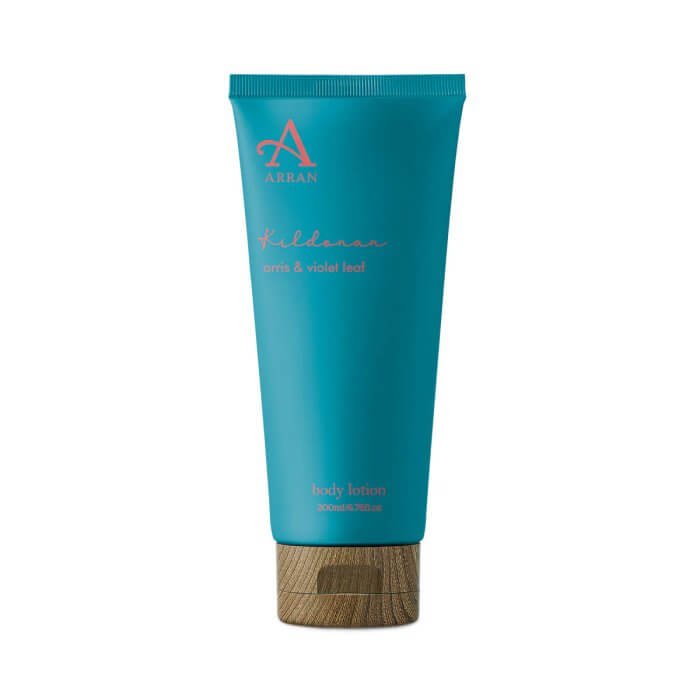 Blue tube of Arran Kildonan body lotion with a wooden cap, labeled 'orris & violet leaf'