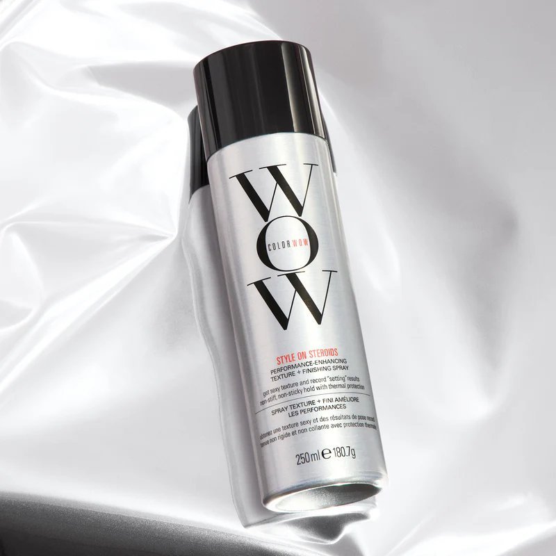 A can of Color Wow style on steroids hair styling spray on a light reflective surface