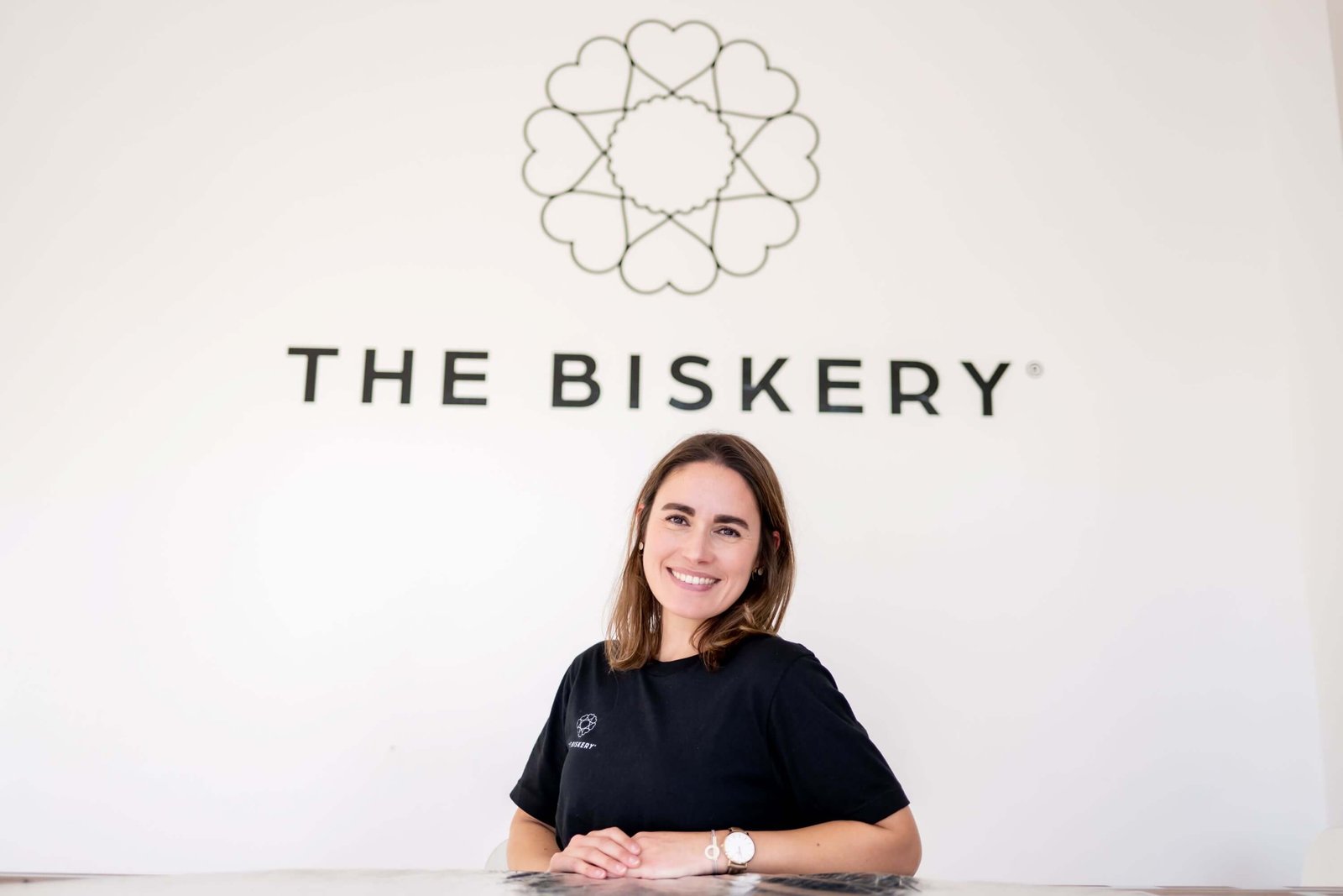 Lisa Shepherd, co-founder of The Biskery, smiling inside the Leeds-based gifting company headquarters built around flexible working and motherhood