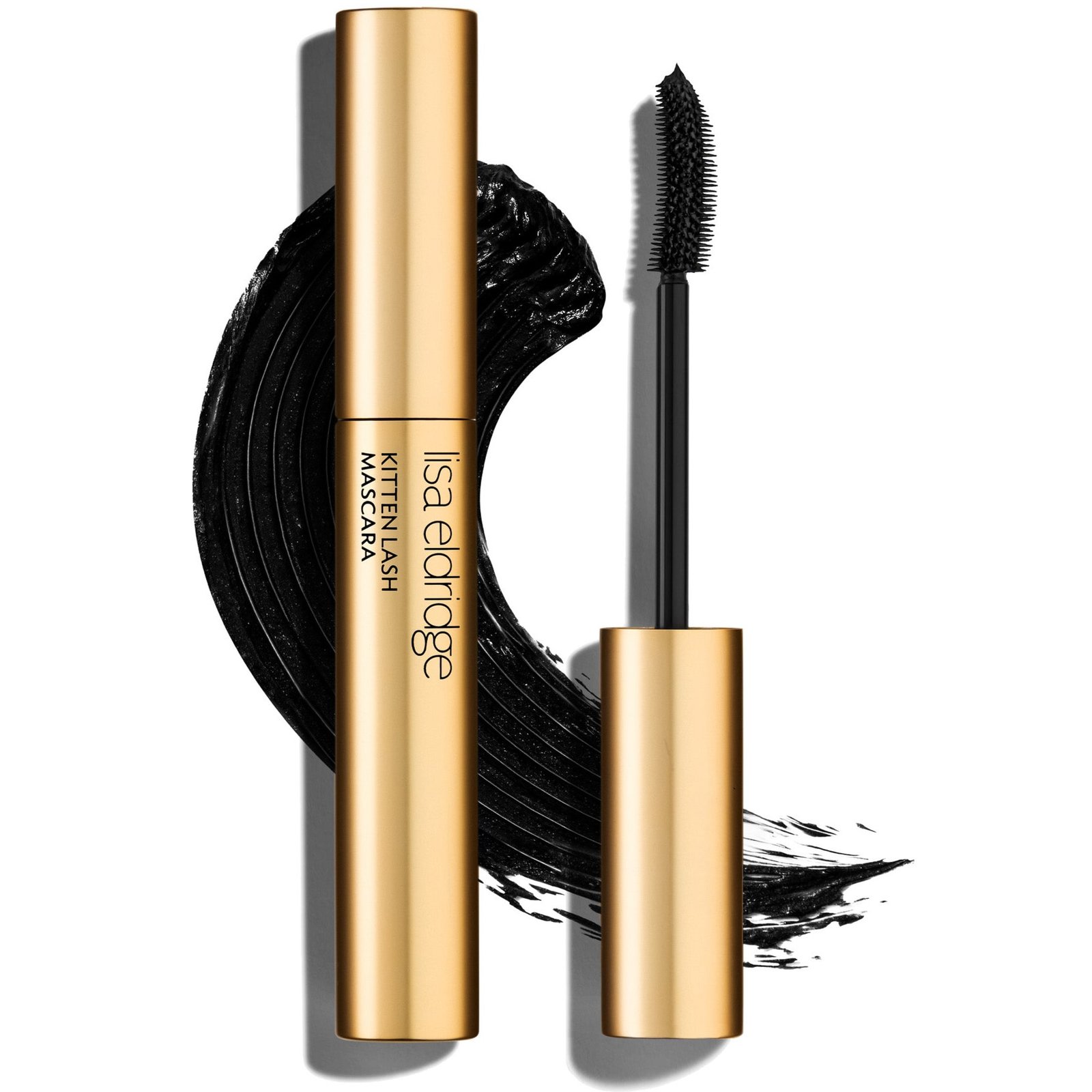 Lisa Eldridge Kitten Lash Mascara in a gold tube with a black wand and a swirl of black mascara