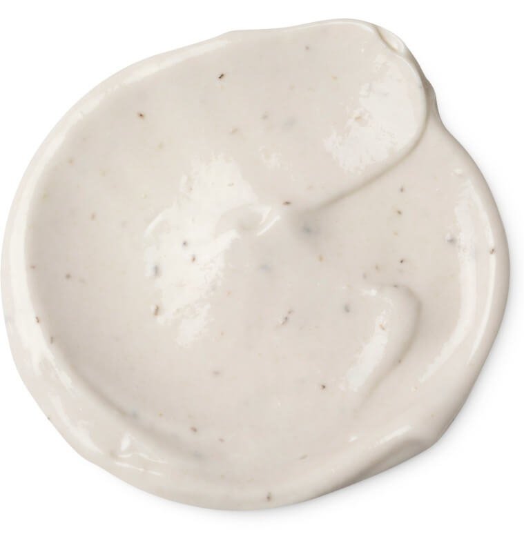 Product image of Lush's 'Sympathy for the Skin' body lotion, creamy body lotion spread with small exfoliating particles