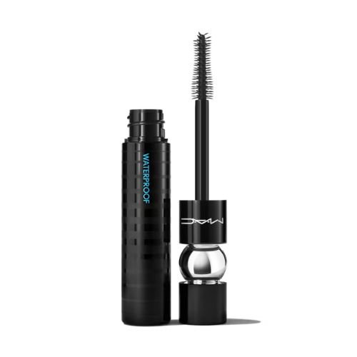 A black tube of MAC Stack waterproof mascara with the wand applicator removed, revealing the brush; the tube has blue text and a silver detail near the base