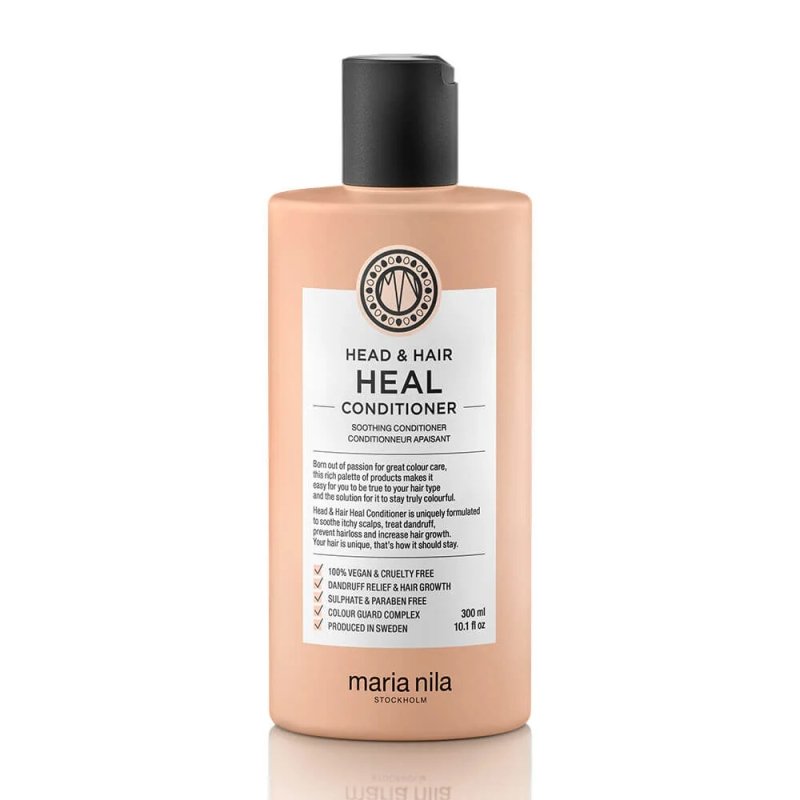 A beige bottle of Maria Nila Head & Hair Heal Conditioner with a black cap and white label