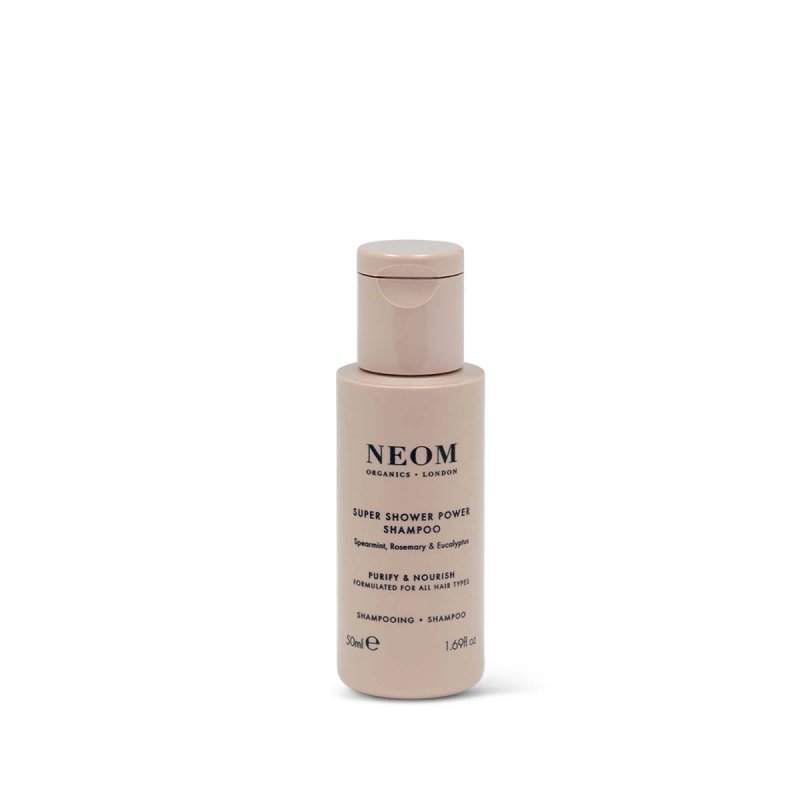 NEOM Super Shower Power Shampoo in a beige bottle with a white cap, labelled for all hair types