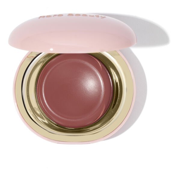 Rare Beauty pink and gold compact of rosy-brown cream blush