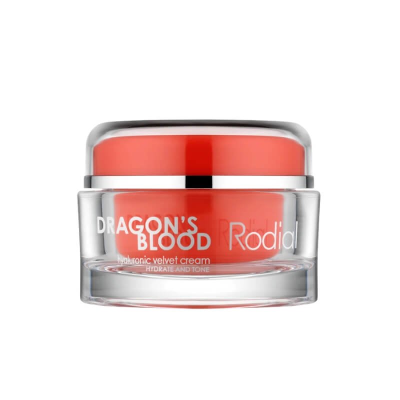 Red hyaluronic velvet cream in a clear jar with a silver lid and the label 'Dragon's Blood' by Rodial