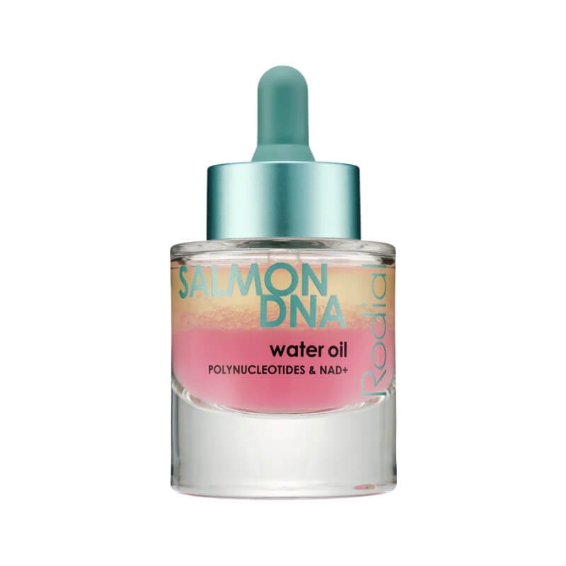 Glass bottle of Rodial Salmon DNA Water Oil with a dropper, showcasing layered pink and clear liquid
