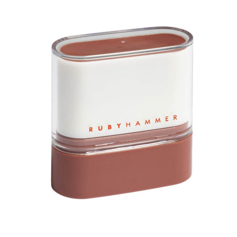 Ruby Hammer Beauty, tawny-coloured makeup stick with a clear cap and a white base