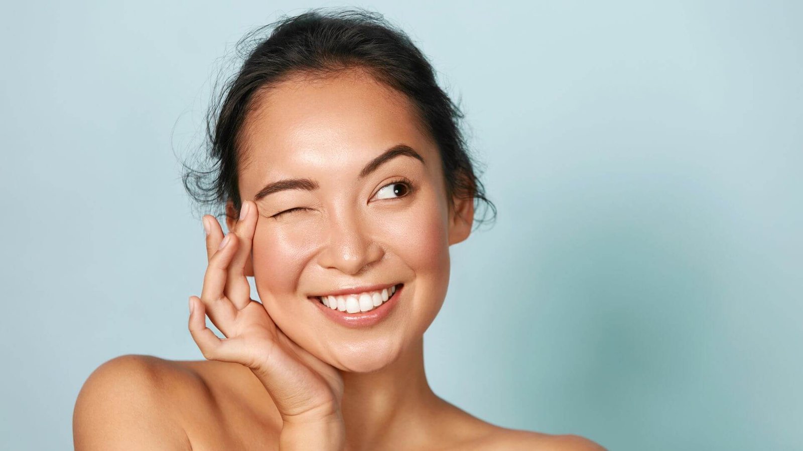 Woman with glowing skin representing Profhilo Structura injectable treatment review