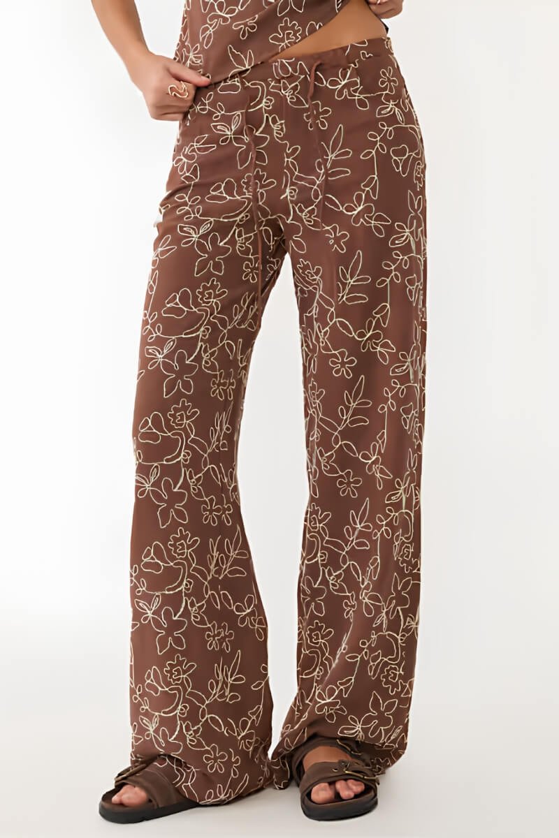 Stradivarius brown embroidered straight-leg trousers with floral patterns and a relaxed fit