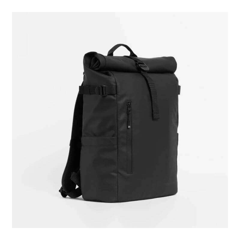 Stubble & Co black 20L roll-top backpack shown in angled product view with adjustable straps and front zip pocket. This durable, minimalist backpack is perfect for daily commuting or weekend trips.