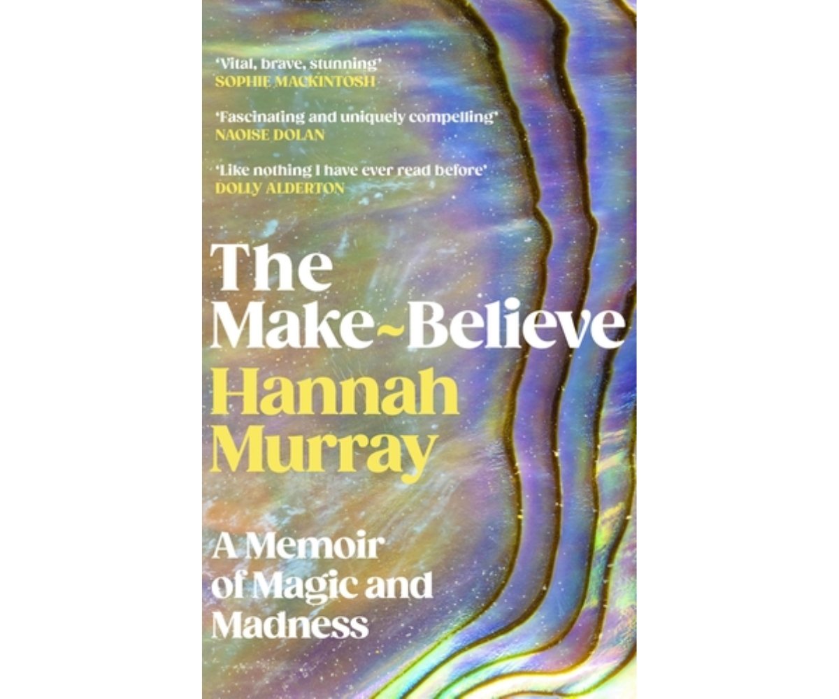 Book cover of 'The Make-Believe: A Memoir of Magic and Madness' by Skins Star Hannah Murray, showing a colourful, iridescent abstract background and reviews.