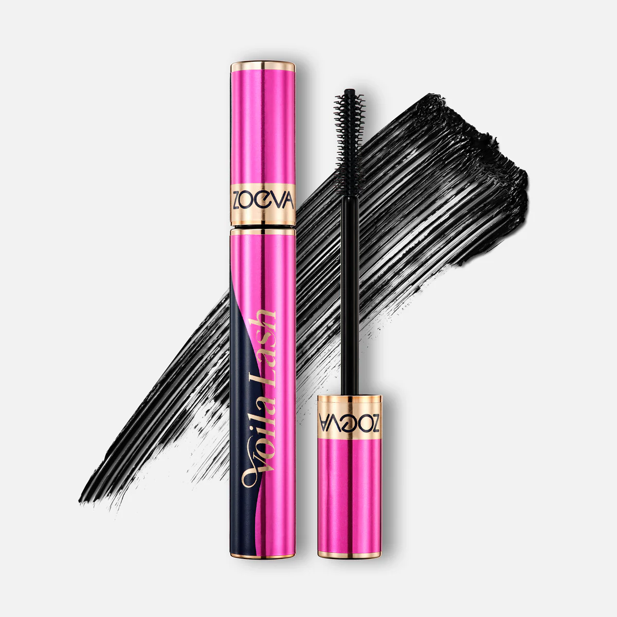 Mascara tube with a pink and black design, alongside a brush and a swipe of black mascara